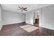 Another view of the bedroom featuring hardwood floors and a ceiling fan at 3908 Total Eclipse St, Las Vegas, NV 89129