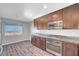 Well-lit kitchen with stainless steel appliances, granite countertops, and a view of the city at 3908 Total Eclipse St, Las Vegas, NV 89129