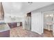 Open kitchen with stainless steel appliances, granite countertops, and wood floors at 3908 Total Eclipse St, Las Vegas, NV 89129