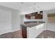 Modern kitchen with granite countertops, stainless steel appliances, and pendant lighting at 3908 Total Eclipse St, Las Vegas, NV 89129