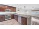 Modern kitchen with granite countertops, stainless steel appliances, and breakfast bar at 3908 Total Eclipse St, Las Vegas, NV 89129