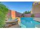 Inviting backyard oasis featuring a private pool and spa, perfect for relaxation at 3908 Total Eclipse St, Las Vegas, NV 89129