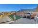 Unique roof deck with turf, grill, cactus detail and mountain views at 3908 Total Eclipse St, Las Vegas, NV 89129