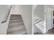 Carpeted stairway leads to upper level, enhanced with modern handrail at 3908 Total Eclipse St, Las Vegas, NV 89129