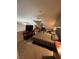 Cozy bedroom with neutral carpet, slanted ceiling and a view from above at 3975 N Hualapai Way # 246, Las Vegas, NV 89129
