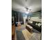 Living room featuring a ceiling fan and a colorful rug at 3975 N Hualapai Way # 246, Las Vegas, NV 89129