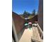 Enclosed patio area offering outdoor relaxation with seating and views of the surrounding neighborhood at 3975 N Hualapai Way # 246, Las Vegas, NV 89129