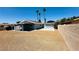 Spacious backyard with low maintenance landscaping featuring gravel and a covered patio at 4238 Boratko St, Las Vegas, NV 89115