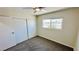 This bedroom includes gray carpeting, a closet, and a bright window for natural light at 4238 Boratko St, Las Vegas, NV 89115