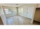 Another bedroom with tile flooring, natural light and a neutral color palette at 4238 Boratko St, Las Vegas, NV 89115
