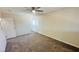 This is a bedroom with carpet flooring, neutral walls, ceiling fan and window at 4238 Boratko St, Las Vegas, NV 89115