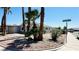 Street corner view of a well-kept single Gathering home with desert landscaping at 4238 Boratko St, Las Vegas, NV 89115