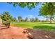 Scenic view of the lush green golf course from the backyard, perfect for outdoor recreation at 5000 Linkside Dr, Las Vegas, NV 89130