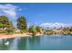 Scenic view of a pond within the community, featuring trees and a fountain at 5000 Linkside Dr, Las Vegas, NV 89130