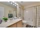 Bathroom featuring a bathtub, shower, and vanity at 5415 W Harmon Ave # 2075, Las Vegas, NV 89103
