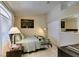 Bedroom with a twin bed, tiled floors, and modern decor at 5415 W Harmon Ave # 2075, Las Vegas, NV 89103