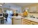 The kitchen opens up to the living room at 5415 W Harmon Ave # 2075, Las Vegas, NV 89103
