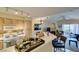 Open kitchen with stainless steel appliances, breakfast bar seating, and easy access to the dining area at 5415 W Harmon Ave # 2075, Las Vegas, NV 89103