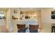 Practical kitchen with a breakfast bar, ample counter space and easy access to other living areas at 5415 W Harmon Ave # 2075, Las Vegas, NV 89103