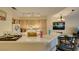 Well-equipped kitchen features a breakfast bar and seamless connection to the adjacent living spaces at 5415 W Harmon Ave # 2075, Las Vegas, NV 89103