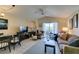 This living area is open to the dining room and features a cozy fireplace at 5415 W Harmon Ave # 2075, Las Vegas, NV 89103