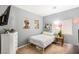 Bedroom with carpet floors, a window, and a white dresser at 5917 Horsehair Blanket Dr, North Las Vegas, NV 89081