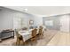 Open-concept dining room with ample natural light, perfect for entertaining guests and Gathering at 5917 Horsehair Blanket Dr, North Las Vegas, NV 89081
