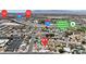 Expansive aerial view of a neighborhood, showing the proximity to the freeway and the Charleston Neighborhood Preservation Park at 6628 Celeste Ave, Las Vegas, NV 89107