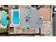 Aerial view of a home showcasing a refreshing swimming pool, neutral toned roof, and concrete patio at 6628 Celeste Ave, Las Vegas, NV 89107