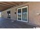 A large covered balcony has access to the interior of the home through sliding glass doors at 6628 Celeste Ave, Las Vegas, NV 89107