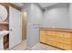This bathroom boasts a sink, cabinet, and tiled floor for added convenience at 6628 Celeste Ave, Las Vegas, NV 89107