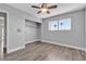 Bedroom with closet, hardwood floors, ceiling fan and exterior view at 6628 Celeste Ave, Las Vegas, NV 89107