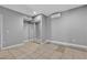 A neutral bedroom boasts ample closet space and tiled flooring at 6628 Celeste Ave, Las Vegas, NV 89107