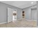 An airy living room with tiled floors provides access to the kitchen and bathroom at 6628 Celeste Ave, Las Vegas, NV 89107