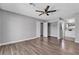 Comfortable main bedroom offering hardwood floors, closet, and ensuite bathroom with a sink at 6628 Celeste Ave, Las Vegas, NV 89107