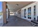 Covered patio with tiled floors and view of the pool at 6628 Celeste Ave, Las Vegas, NV 89107