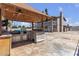 Entertainer's backyard with pool, outdoor kitchen, and covered patio at 6628 Celeste Ave, Las Vegas, NV 89107