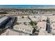 Aerial shot of desert condos showcases well-maintained exteriors and convenient parking spaces with scenic surroundings at 6808 Indian Chief Dr # 204, Las Vegas, NV 89130
