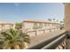 Balcony view of apartments featuring private garages at 6808 Indian Chief Dr # 204, Las Vegas, NV 89130
