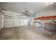 Spacious two-car garage with ample storage and workbench, perfect for projects and parking at 6808 Indian Chief Dr # 204, Las Vegas, NV 89130