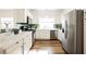 Bright kitchen featuring stainless steel appliances, stone countertops, and decorative tiling at 6808 Indian Chief Dr # 204, Las Vegas, NV 89130