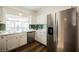 Bright kitchen with stainless steel appliances and a window providing ample natural light at 6808 Indian Chief Dr # 204, Las Vegas, NV 89130