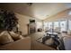 An inviting living room with plush seating and a cozy fireplace at 6808 Indian Chief Dr # 204, Las Vegas, NV 89130