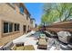 Enjoy the private backyard featuring a modern pool, tiled patio, and comfortable seating area at 6897 Linda Creek Ct, Las Vegas, NV 89178