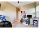 Bedroom with carpet, neutral walls, and a work/play space at 6897 Linda Creek Ct, Las Vegas, NV 89178
