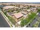 Overhead shot showcasing pool, mature landscaping, and a welcoming community entrance at 6897 Linda Creek Ct, Las Vegas, NV 89178