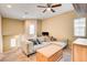 Cozy loft area with comfortable seating, natural light, and staircase view, perfect for relaxation at 6897 Linda Creek Ct, Las Vegas, NV 89178
