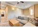 Comfortable loft area featuring plush seating, bright lighting, and an open layout at 6897 Linda Creek Ct, Las Vegas, NV 89178