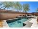Relaxing backyard pool with adjacent patio and outdoor seating, perfect for entertaining guests at 6897 Linda Creek Ct, Las Vegas, NV 89178