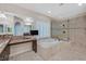 Luxurious bathroom with shower, tub, and granite vanity at 7033 Twin Forks Peak St, Las Vegas, NV 89166